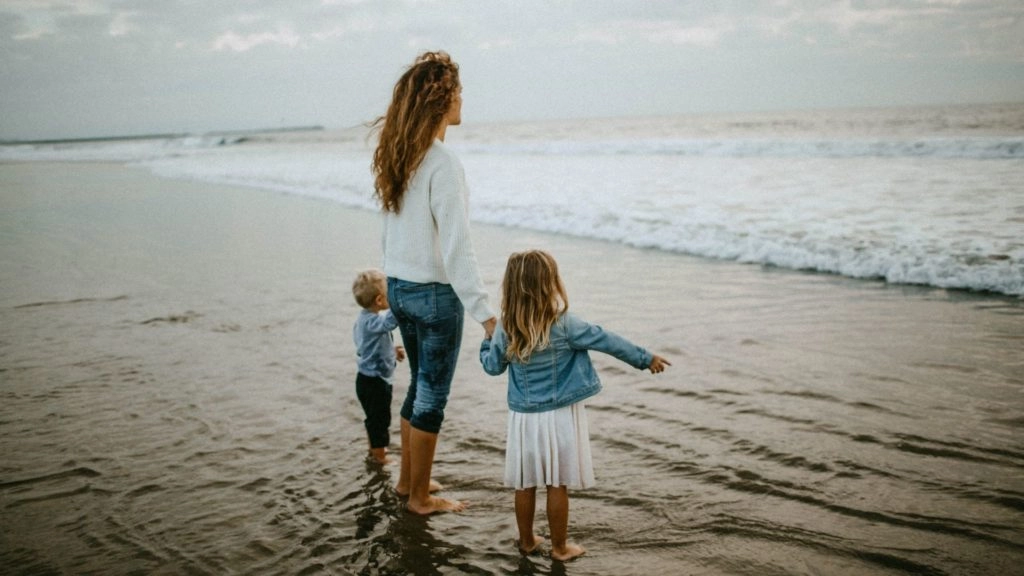 People at the Beach Young Family on a Beach